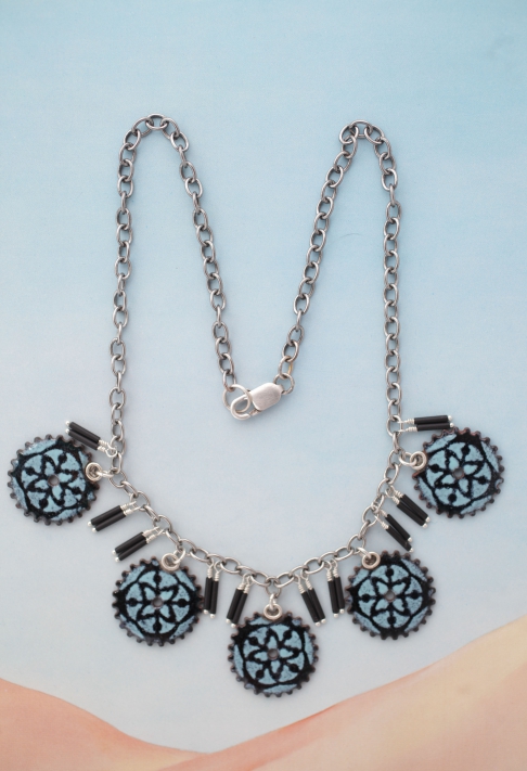 Clockwork Florence Necklace / reversible by Catherine DeYoung | Vitreous enamel on copper with silver plated brass chain.
Sterling silver clasp and findings.
Clockwork Florence Necklace / reversible